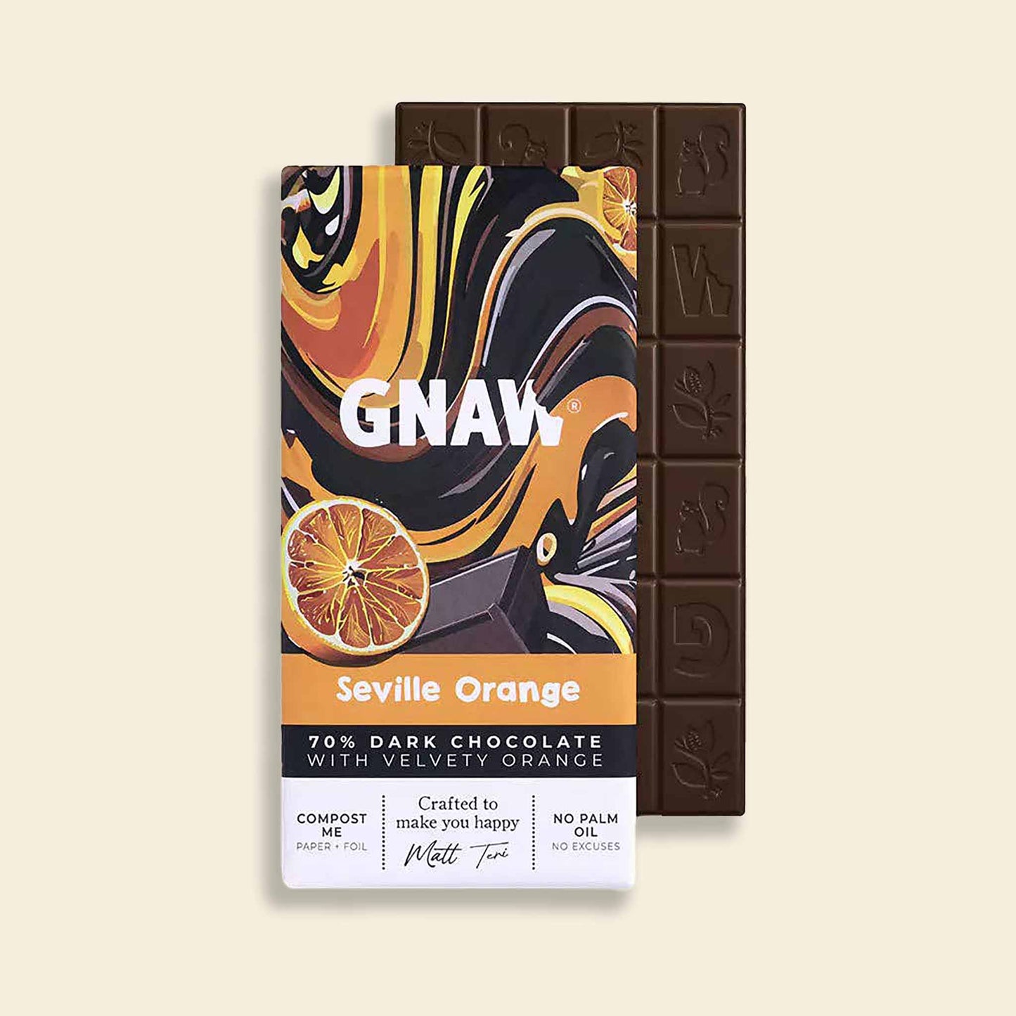 A partially unwrapped bar of Gnaw Seville Orange flavoured dark chocolate