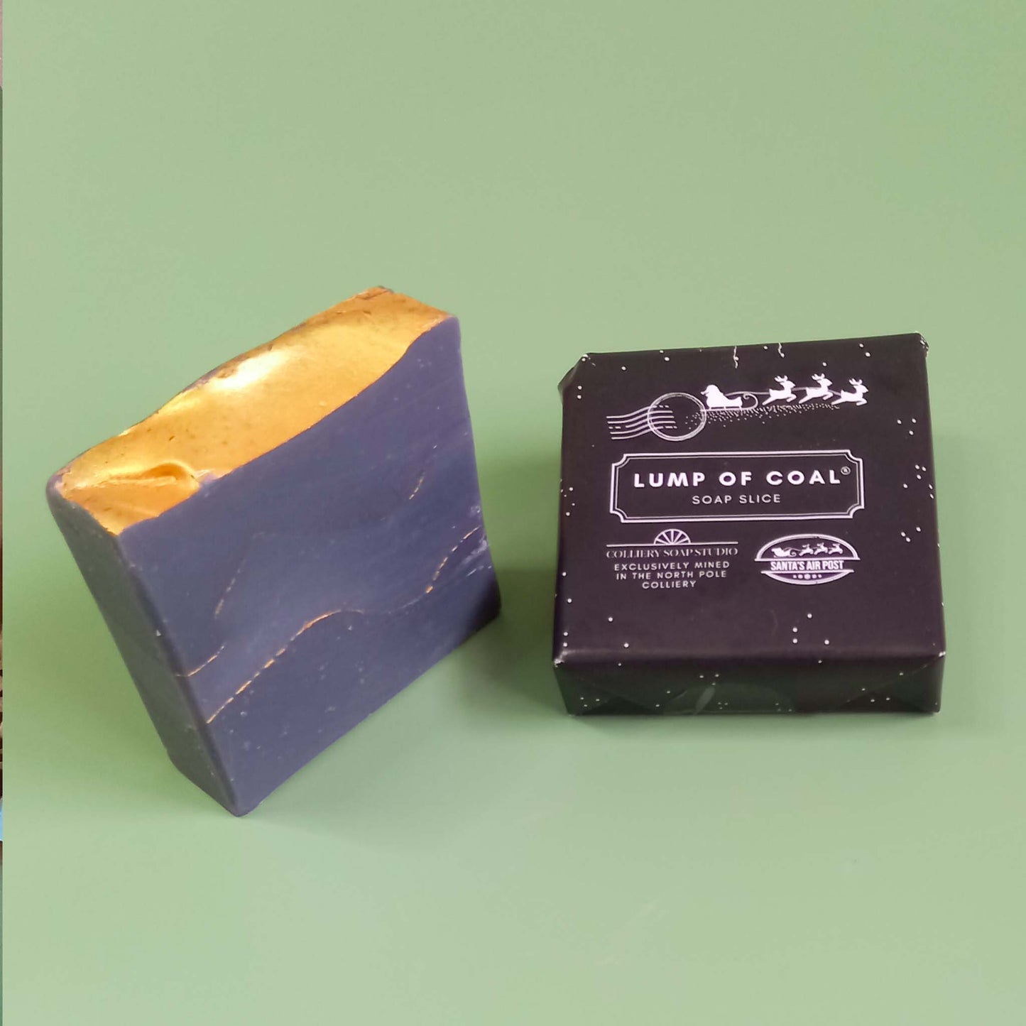 1 bare and 1 wrapped bar of lump of coal Christmas soap