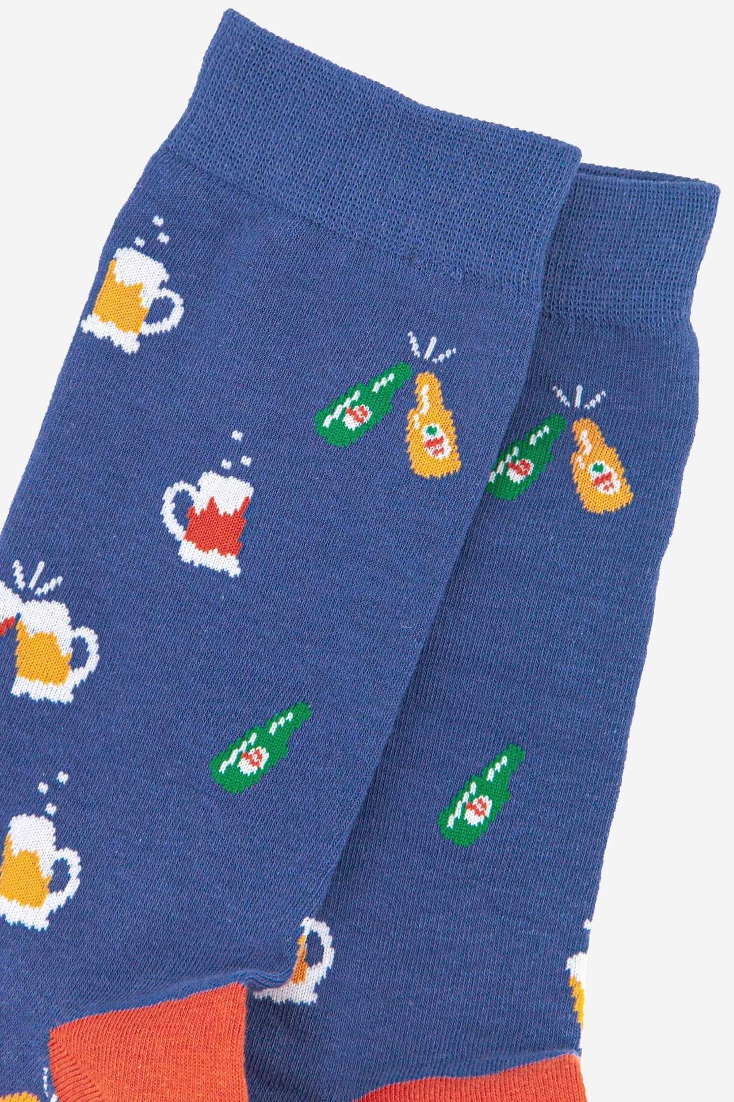 Close up of beer images on blue socks