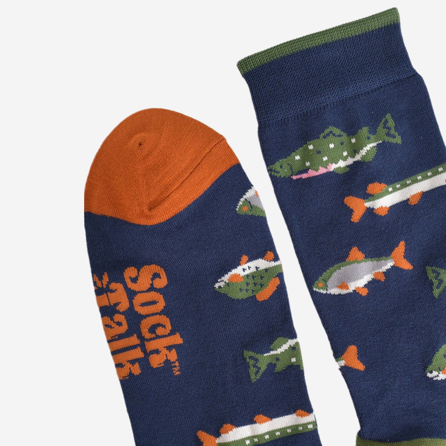 Close up of orange toe and green cuff area of fish themed socks