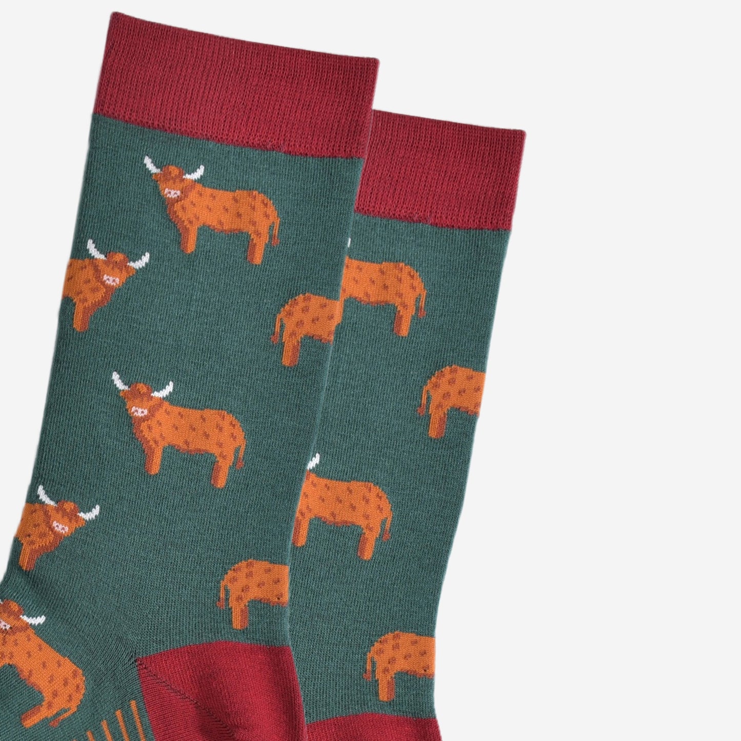 Close up of green highland cow socks