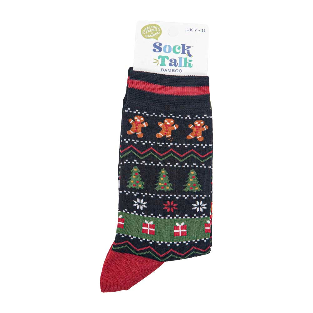Packaged Christmas themed Fair Isle style socks featuring Christmas trees, gingerbread men, gifts and snowflakes. With green toes and red heels