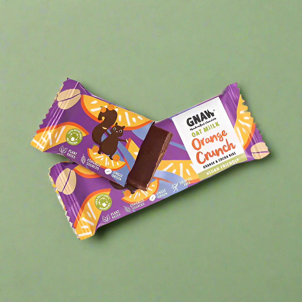 A 35g bar of Gnaw oat milk orange and cocoa nib oat milk vegan chocolate