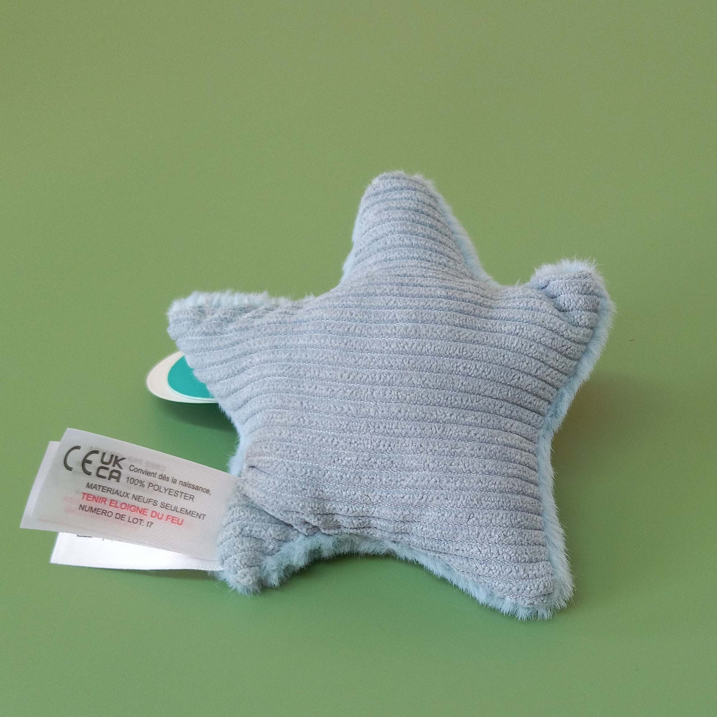Back of soft starfish toy showing corduroy backing
