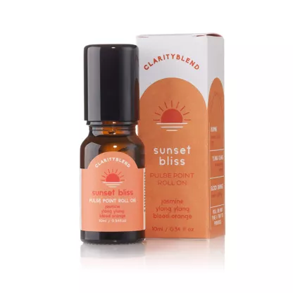 Clarity Blend sunset bliss pulse point  oil and packaging on a white background