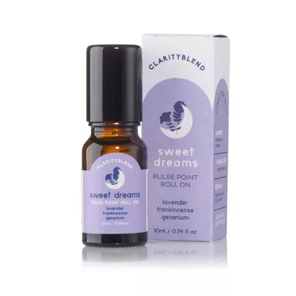 Bottle and box of ClarityBlend sweet dreams pulse point roll on on a white background