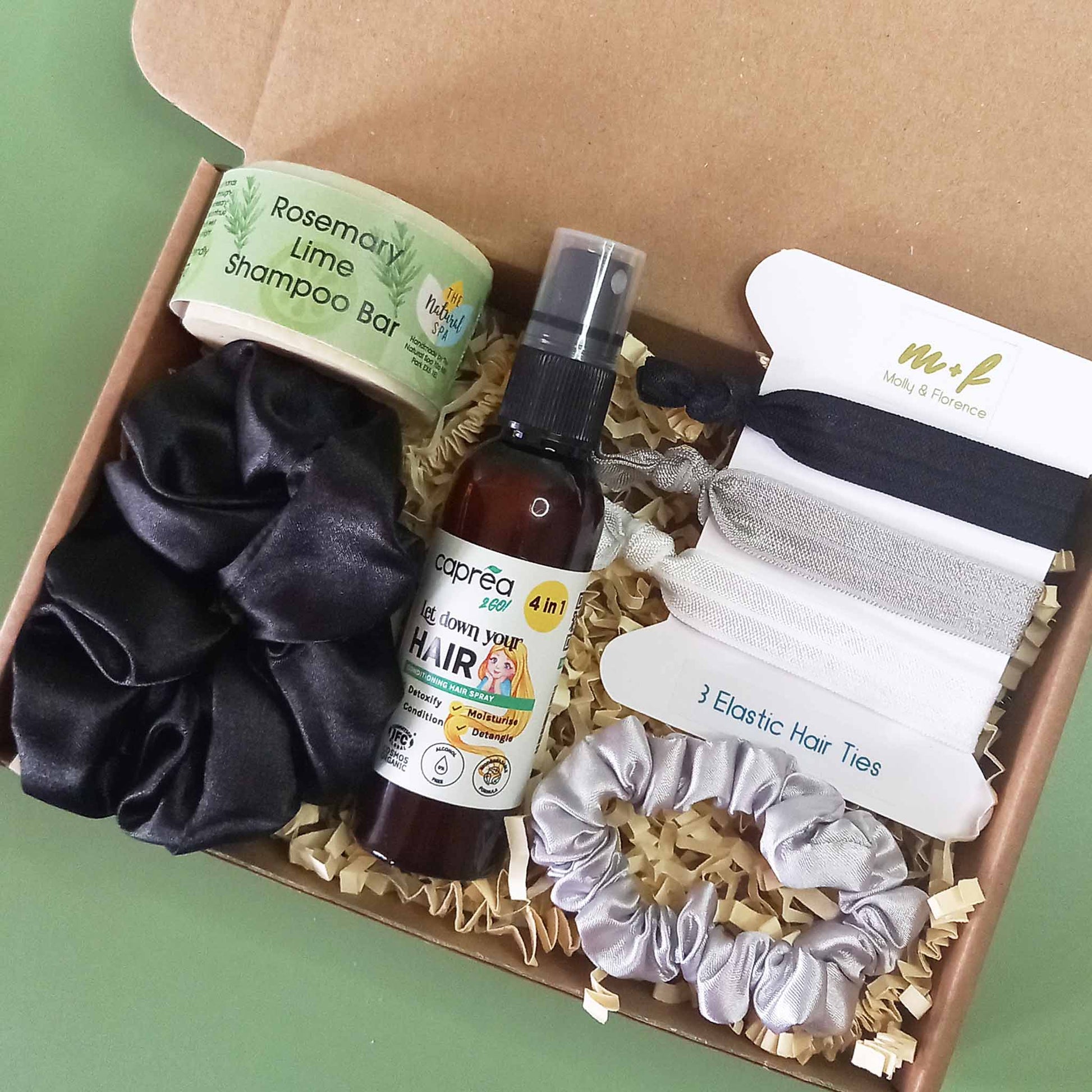 Hair care gift set including shampoo bar, leave is conditioner, elastic hair ties and hair scrunchies