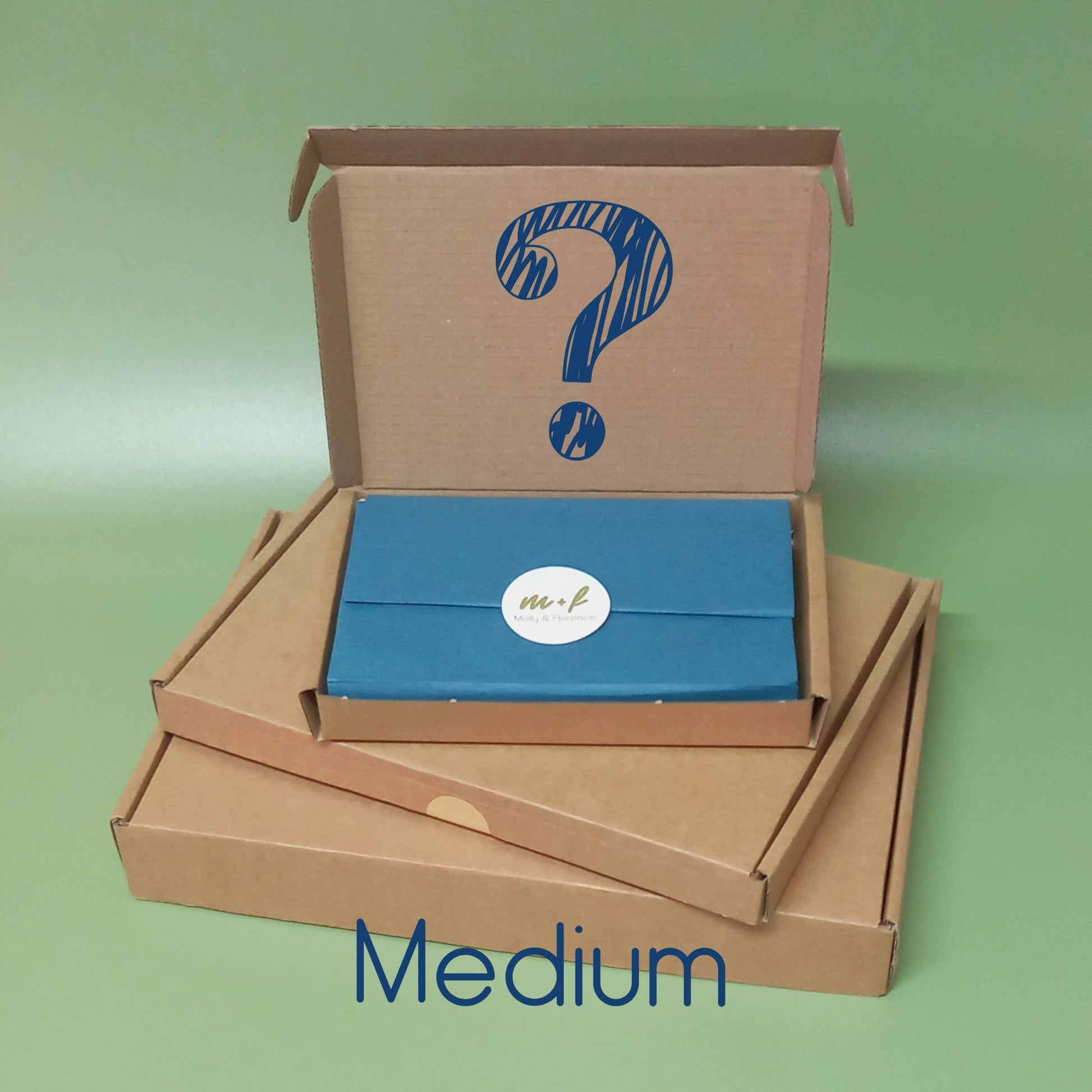 A stack of mystery gift boxes depicting the word medium