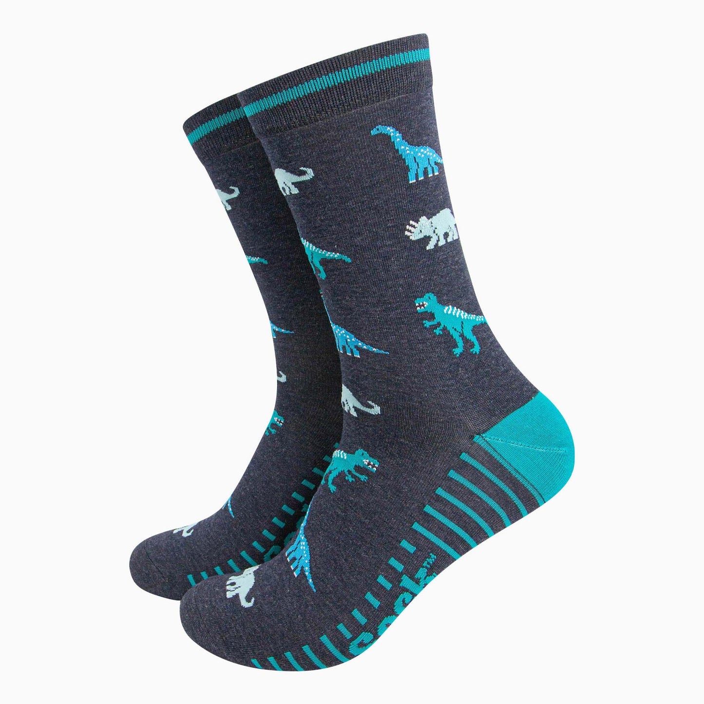 Pair of navy blue socks with dinosaur pattern on a white background