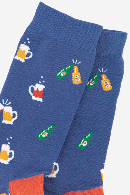 Close up of beer images on blue socks
