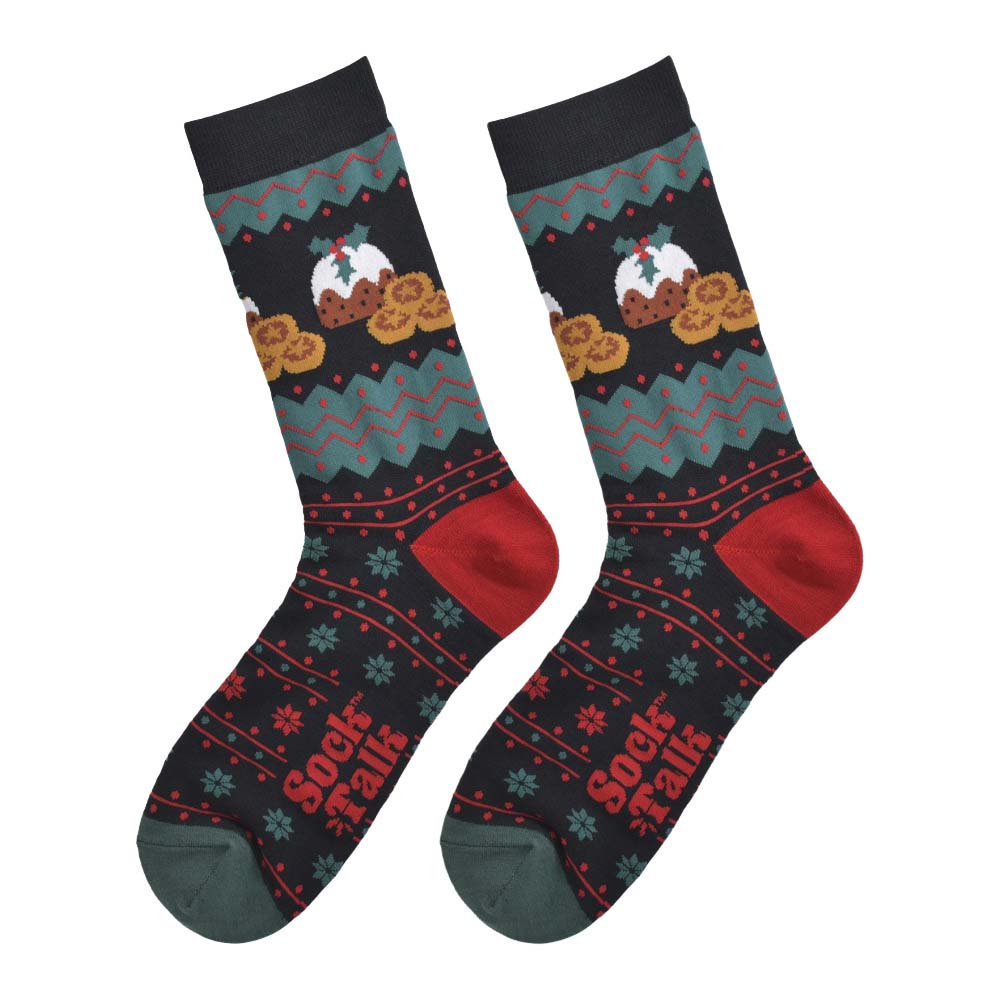 A pair of black socks featuring festive red and green patterns and pictures of Christmas puddings and mince pies. With red heels and green toes
