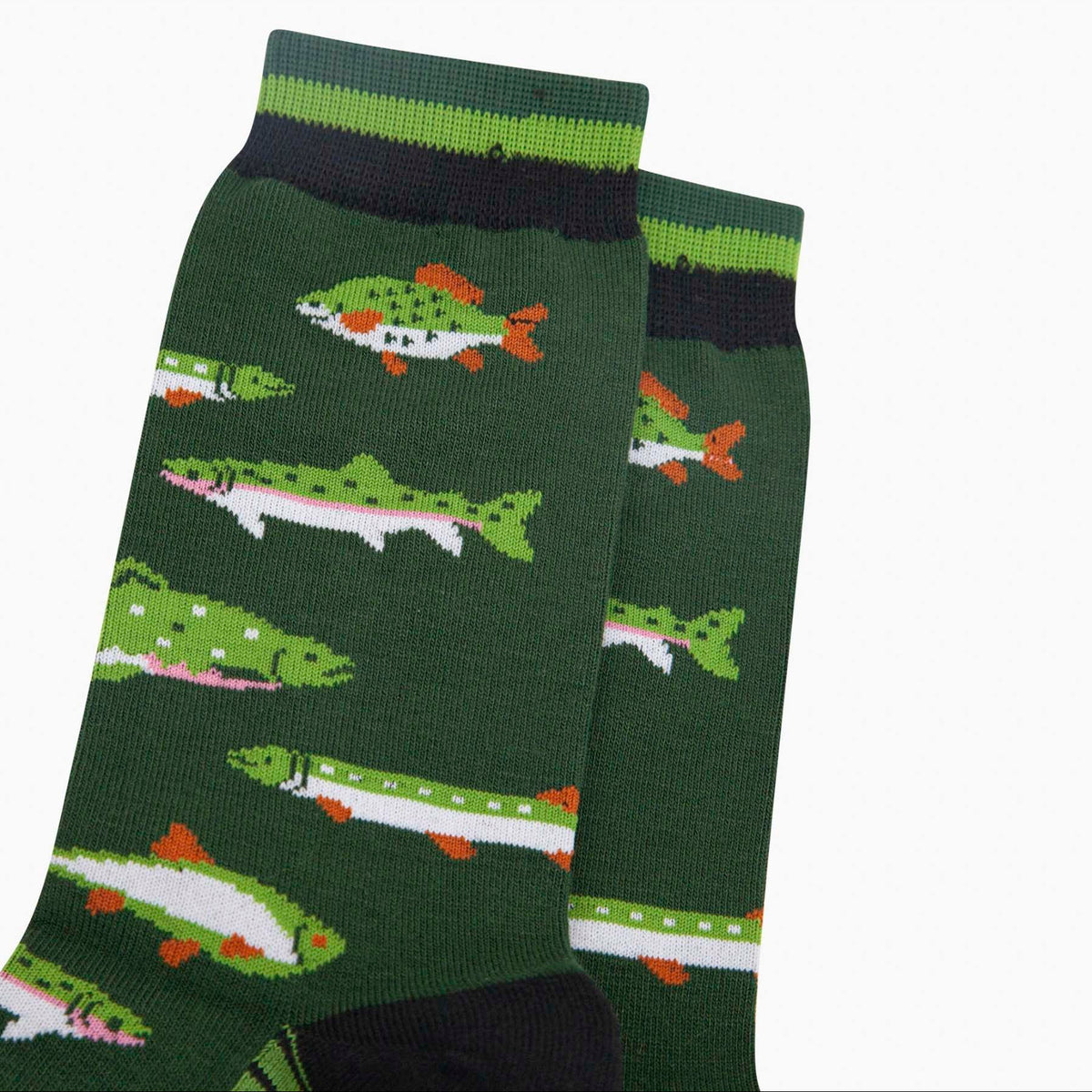 Closeup of a pair of dark green socks depicting various fish with orange and white accents. With green and black striped cuffs