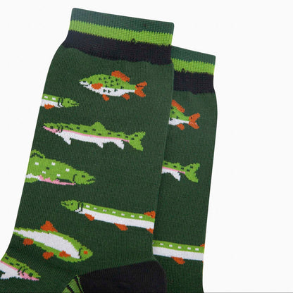 Closeup of a pair of dark green socks depicting various fish with orange and white accents. With green and black striped cuffs