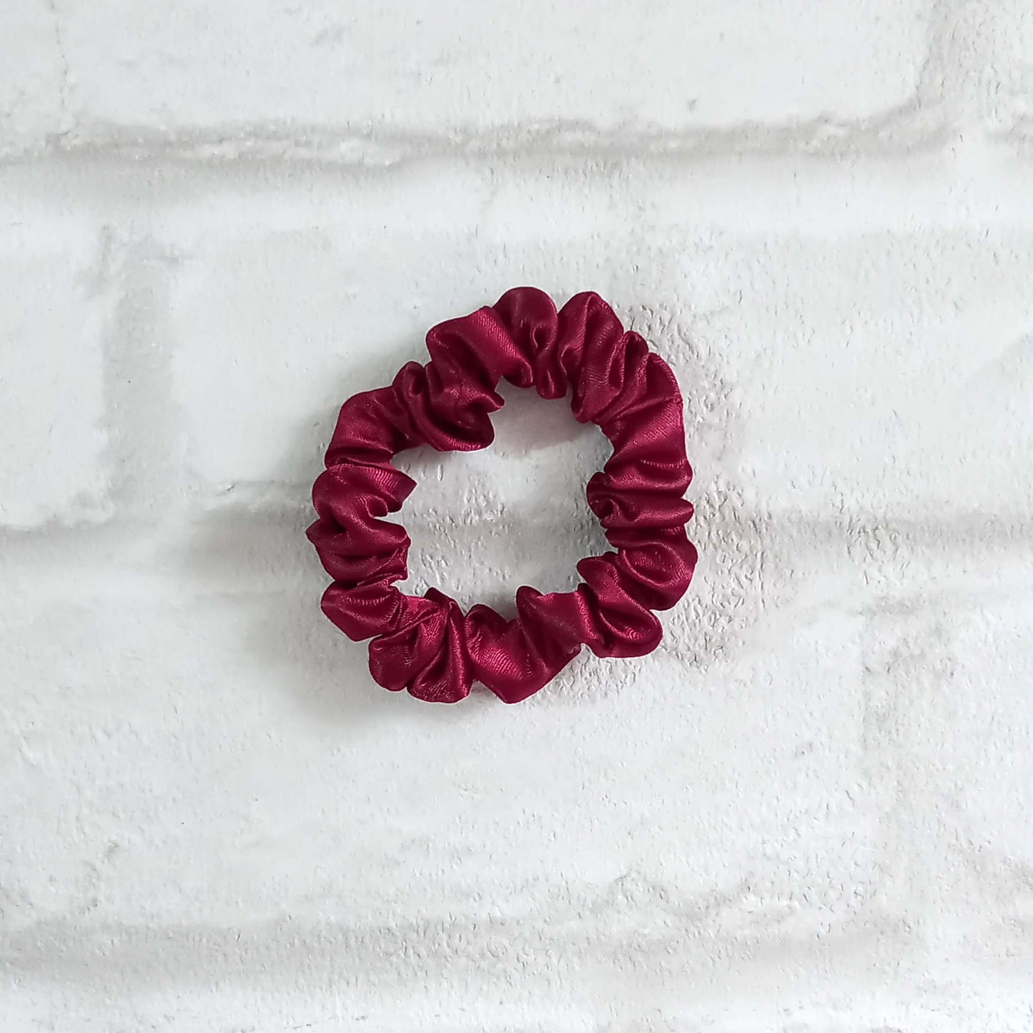 Skinny hair scrunchie in burgundy satin