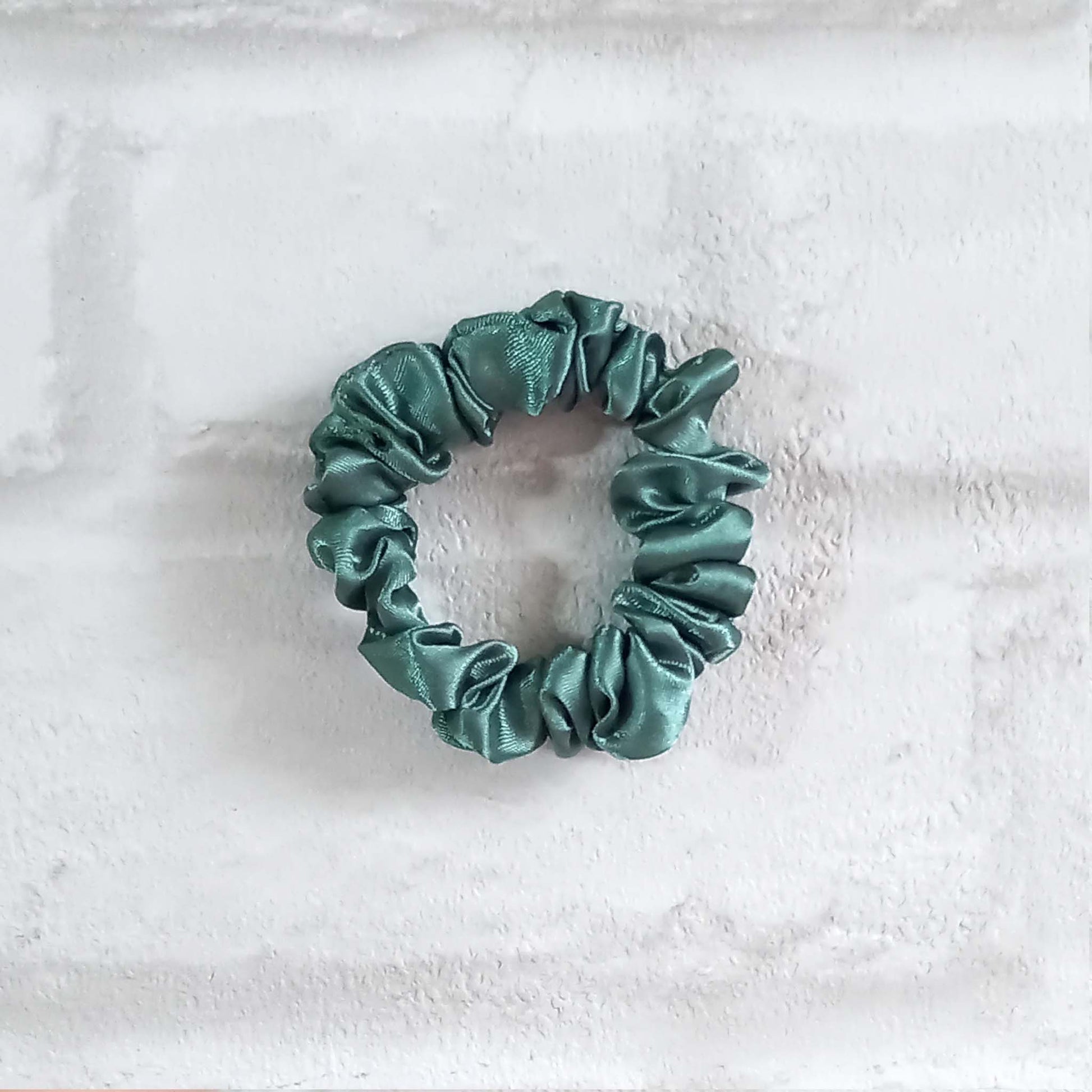 Sage green skinny satin hair scrunchie