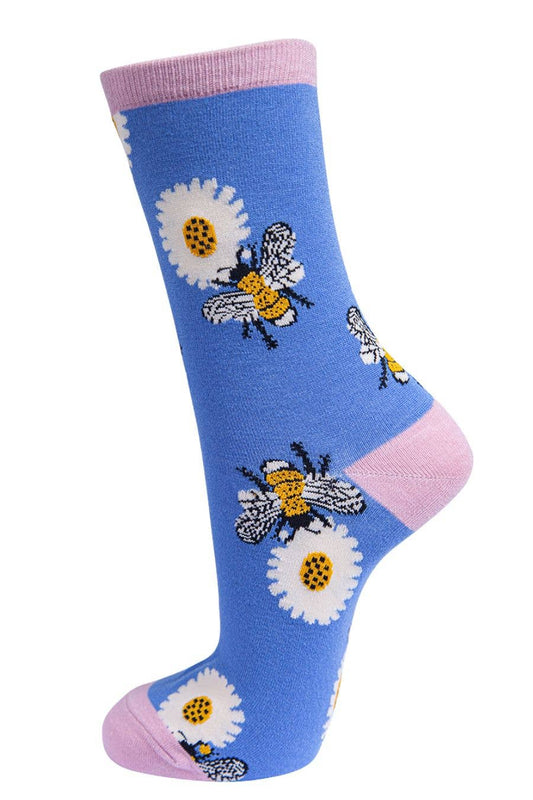 Blue women’s sock featuring bees and sunflowers