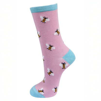 Pink sock with bee pattern and light blue accents on a white background