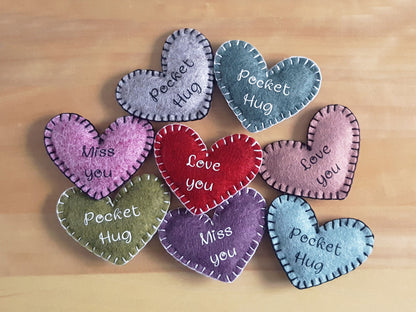 Heart shaped felt pocket hug. Available in 12 colours with personalised text