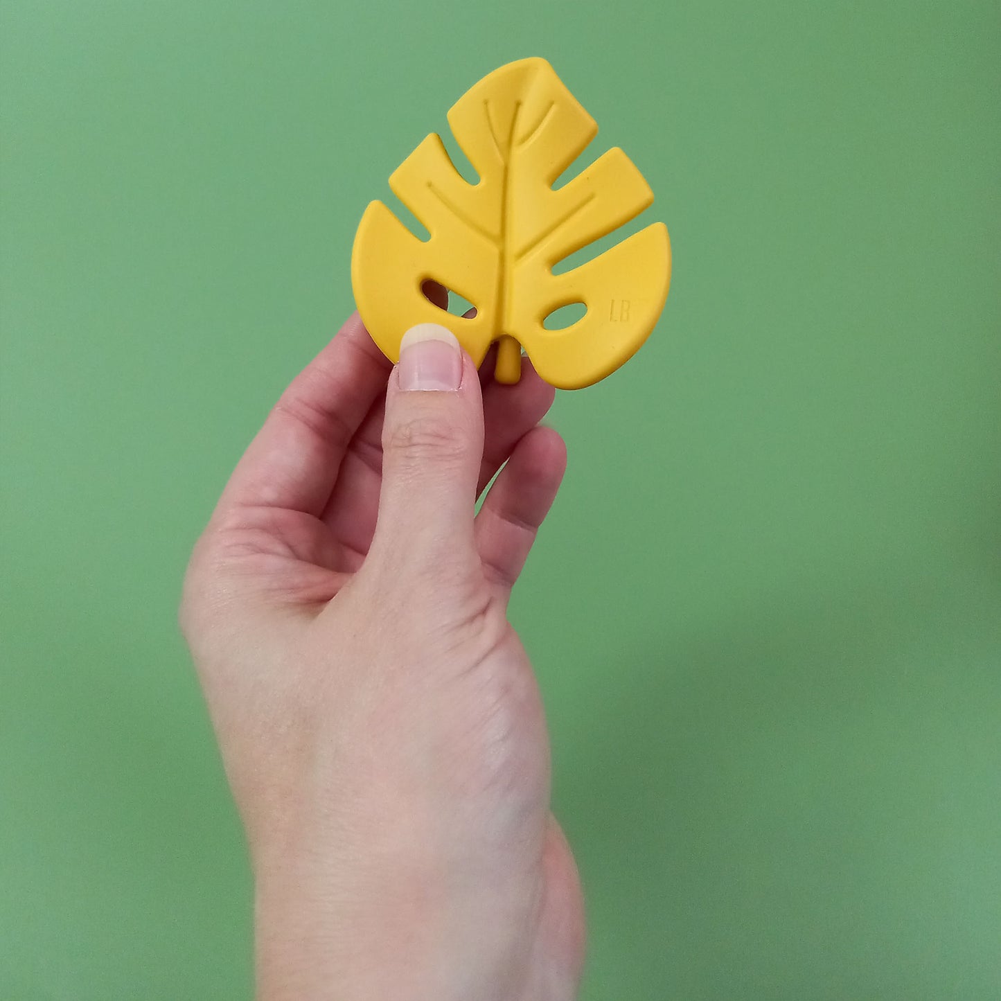 Yellow leaf shaped silicone teether